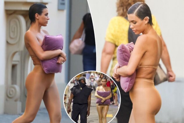 Bianca Censori hides her breasts behind a pillow during Italy stroll with Kanye West