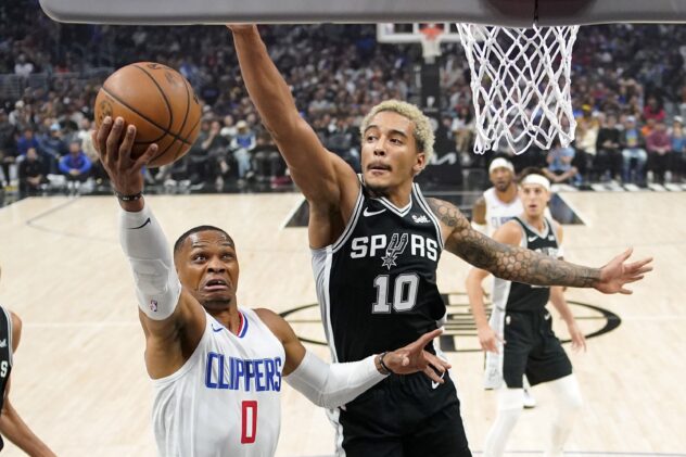 Leonard and George school Wembanyama in rookie’s 1st road game, lead Clippers over Spurs 123-83