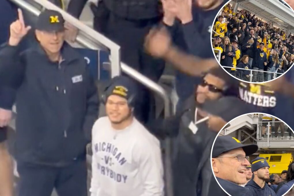 Jim Harbaugh, Michigan get huge cheers and sing fight song at Wolverines hockey game