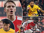 Arsenal 2-1 Wolves: Early strikes by Bukayo Saka and Martin Odegaard send the Gunners four points clear of Man City at Premier League summit but Matheus Cunha's strike ensured a nervy finale at the Emirates