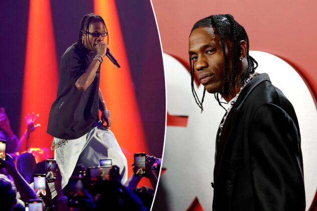 Travis Scott almost knocked off stage by giant floating head during NYC concert