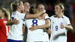 Clinton scores on 'dream debut' as England hit seven