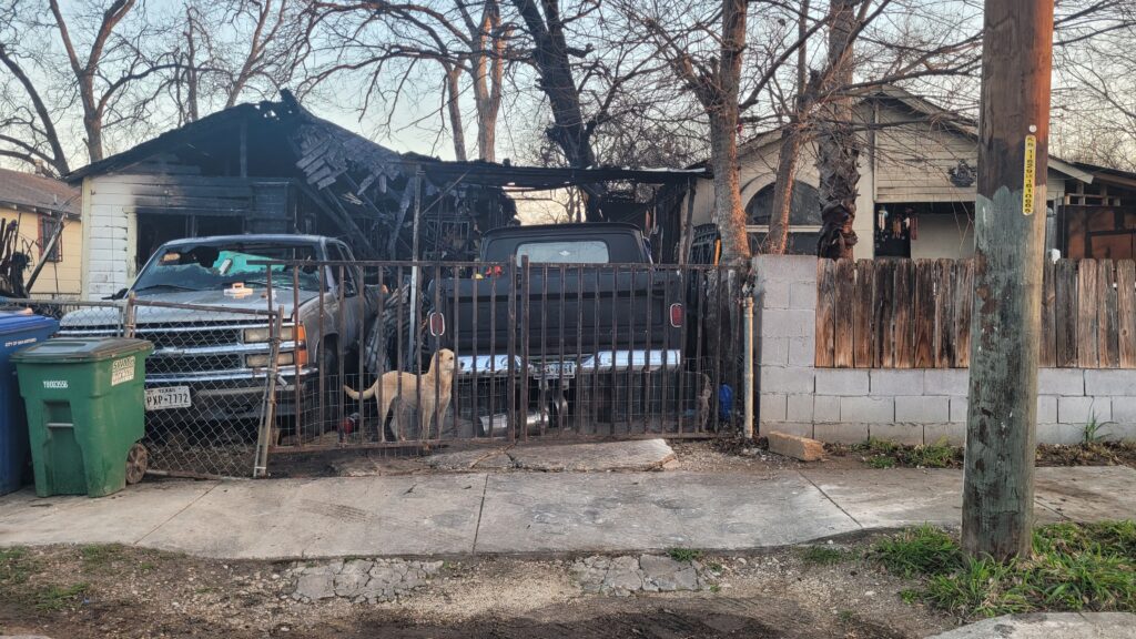 Fire sends families in 2 homes scrambling, leaves man with burns