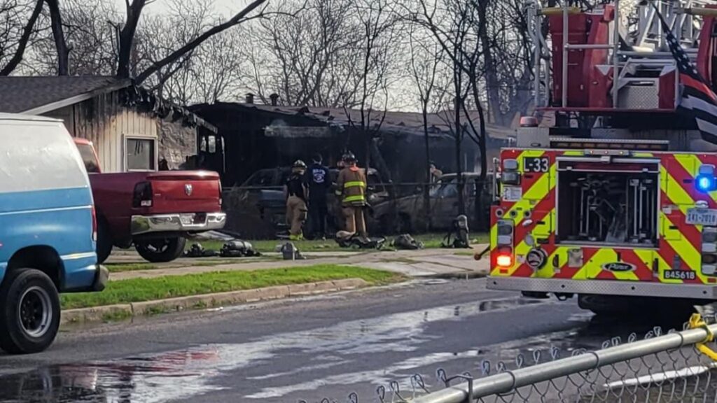 Gusty winds create extra challenge as firefighters battle destructive house fire