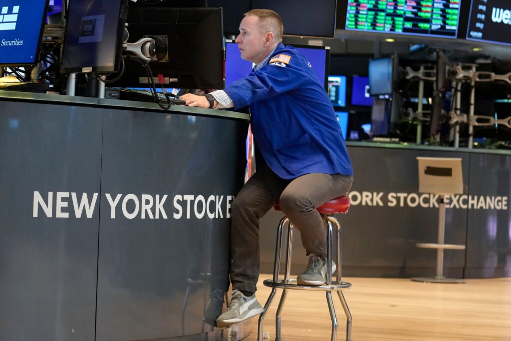Stock market today: Wall Street ticks higher as the bond market calms