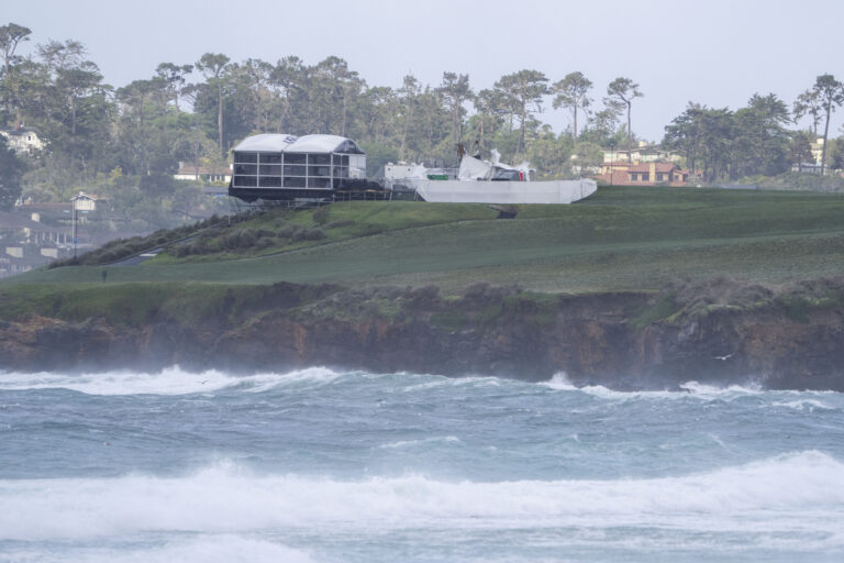 Why did AT&T Pebble Beach Pro-Am get reduced to 54 holes? These dramatic images illustrate