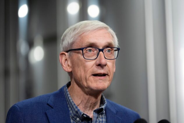 Wisconsin’s Democratic governor signs his new legislative maps into law after Republicans pass them