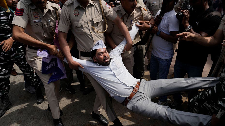 India's police detain dozens of protesters demanding release of opposition leader