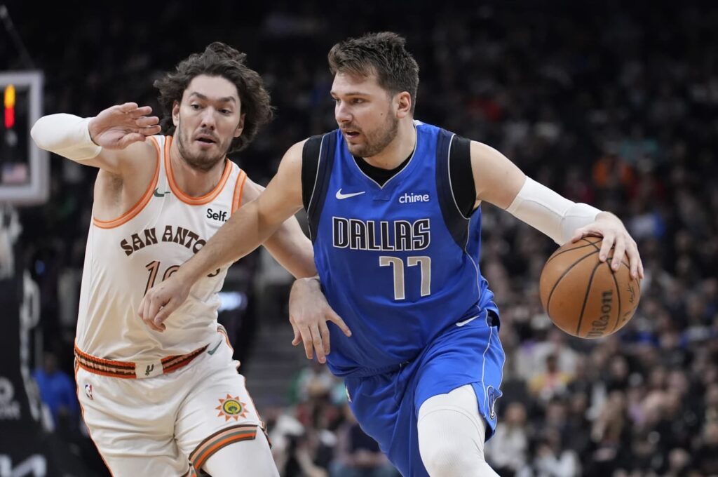 Kyrie Irving, Luka Doncic lead Mavericks past Spurs 113-107 to sweep season series
