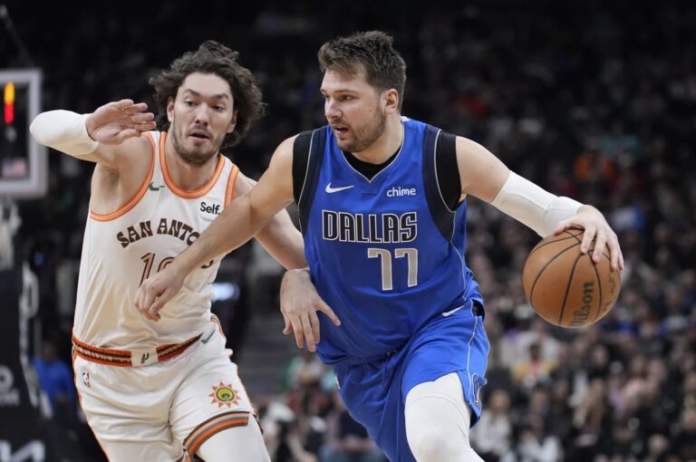 Kyrie Irving, Luka Doncic lead Mavericks past Spurs 113-107 to sweep season series