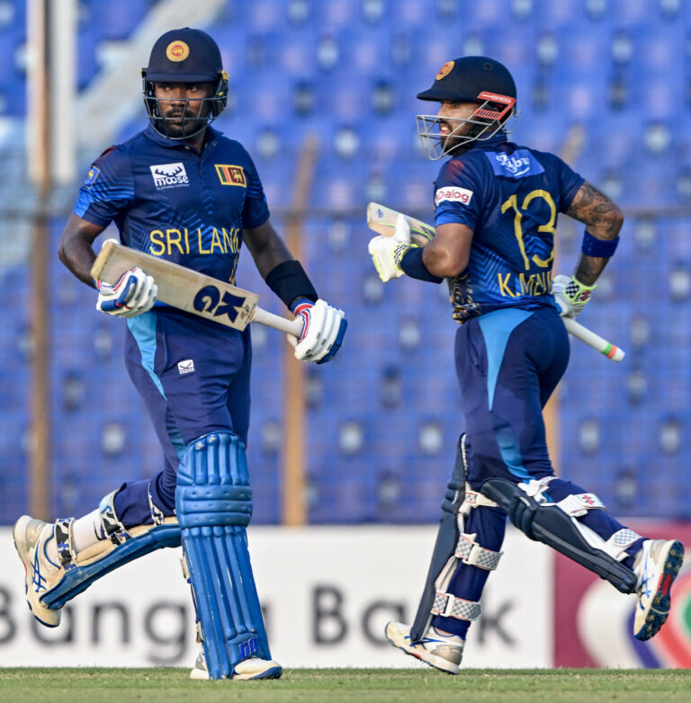 Menids, Liyanage fifties push Sri Lanka to 255