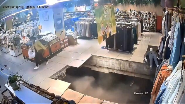 WATCH: Woman falls through floor as possible sinkhole opens up under shopping mall