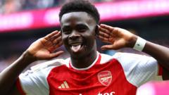 Arsenal survive Spurs rally to go four points clear