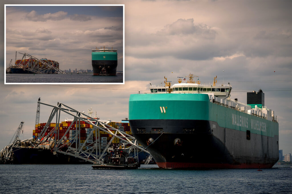 First cargo ship passes Baltimore Key bridge wreck via temporary channel after being trapped for weeks