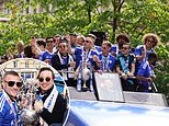 Leicester parade the Championship trophy in front of thousands in open-top bus parade around the city centre after securing promotion back to the Premier League