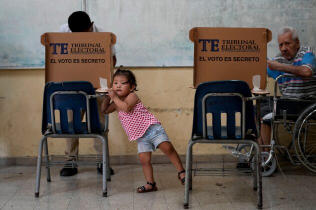 Panamanians vote in an election dominated by a former president who was barred from running