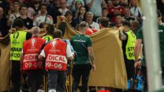 Varga taken off on stretcher in Hungary v Scotland