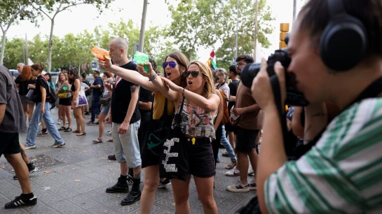 Locals in one Mediterranean hot spot load up water guns to protest mass tourism: 'Go home'