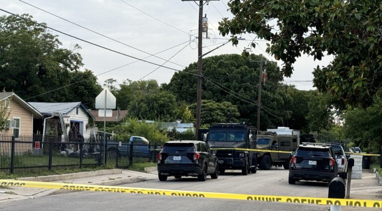 Man wanted on parole violation, three warrants dies after shooting with SWAT officers, police say