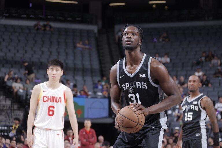 Spurs sign Nathan Mensah to training camp deal