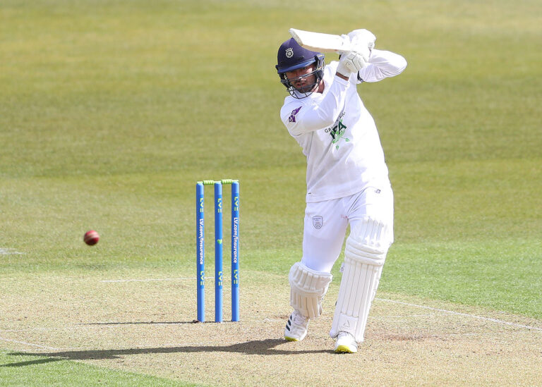 Ian Holland century propels Leicestershire on rain-shortened day