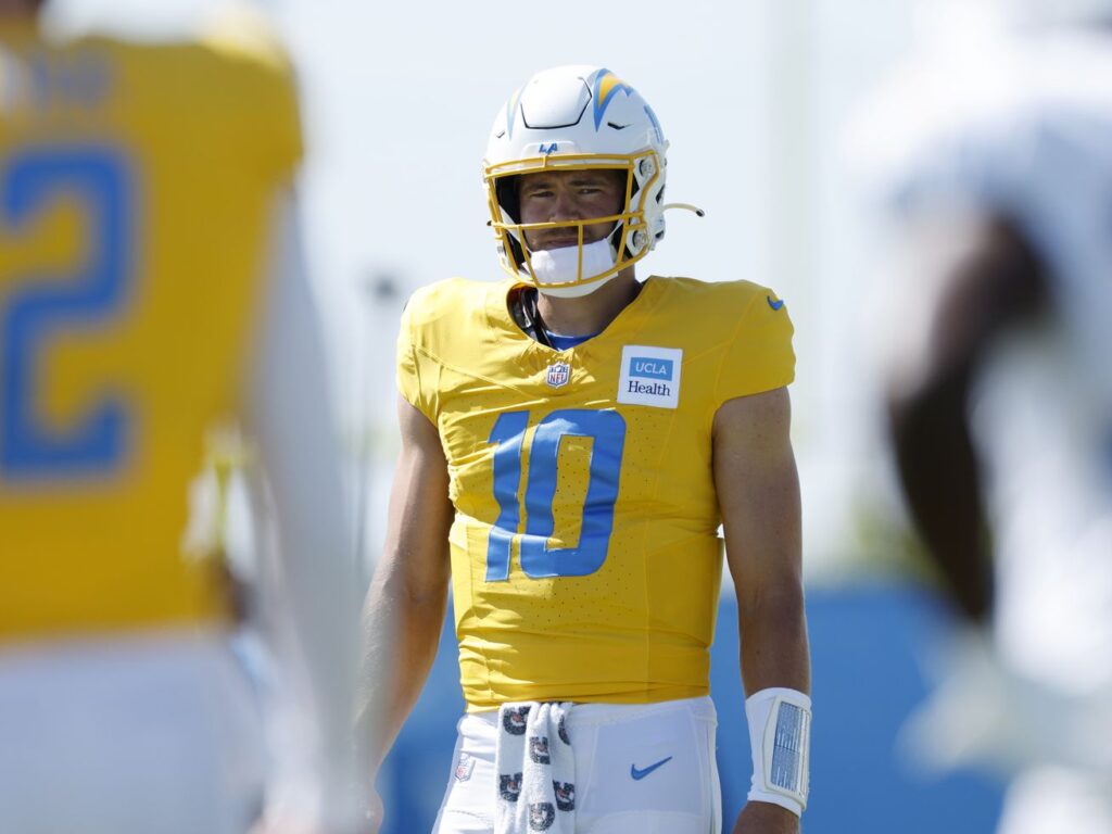 Justin Herbert’s Injury, Animated Training Camp Interactions, and NFL Reality Corner