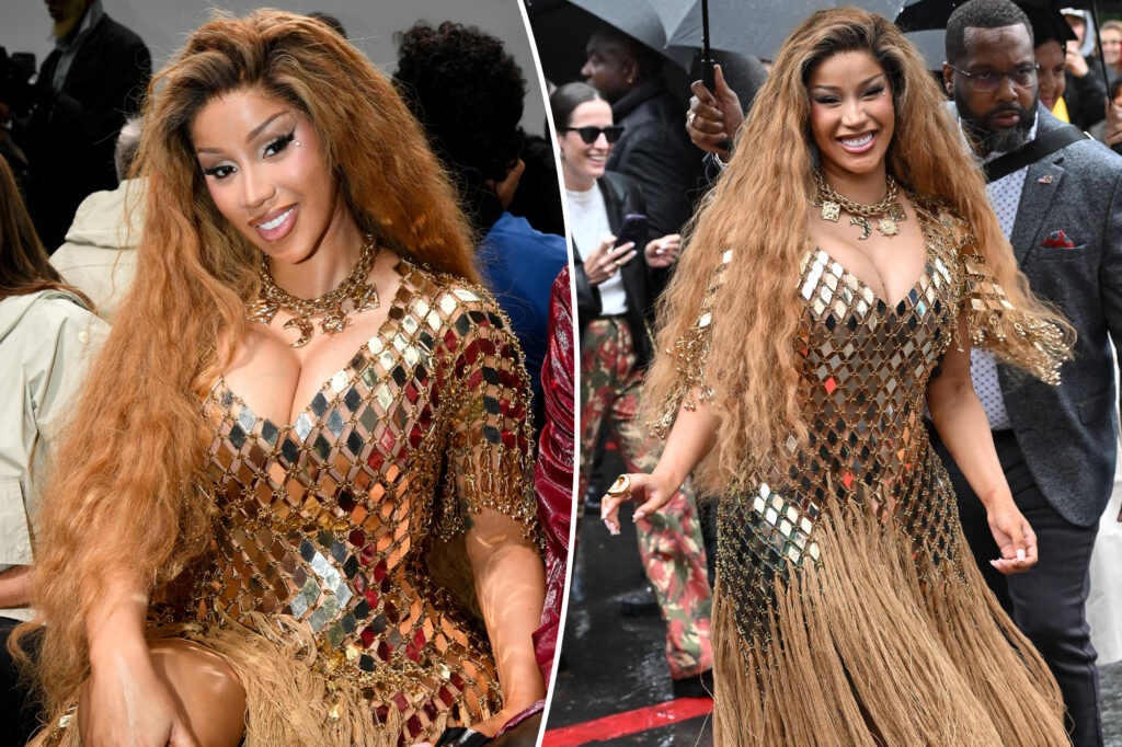 Cardi B goes for gold at Paris Fashion Week in metal and fringe gown