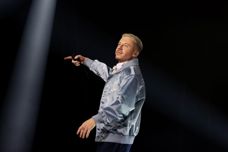 Macklemore Dropped From Music Festival After “F--- America” Comment