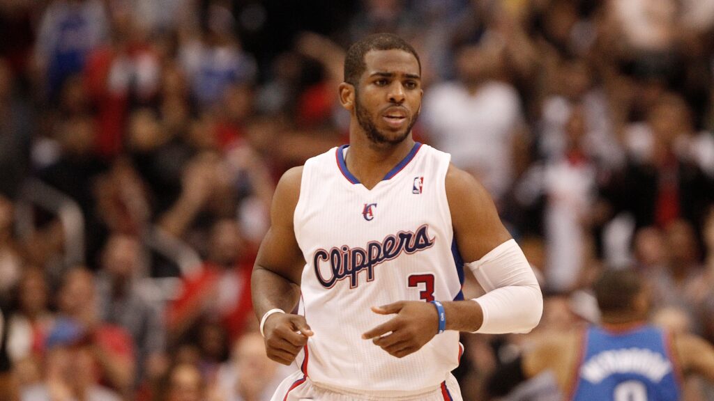 Spurs forward hands over No. 3 jersey to new teammate Chris Paul