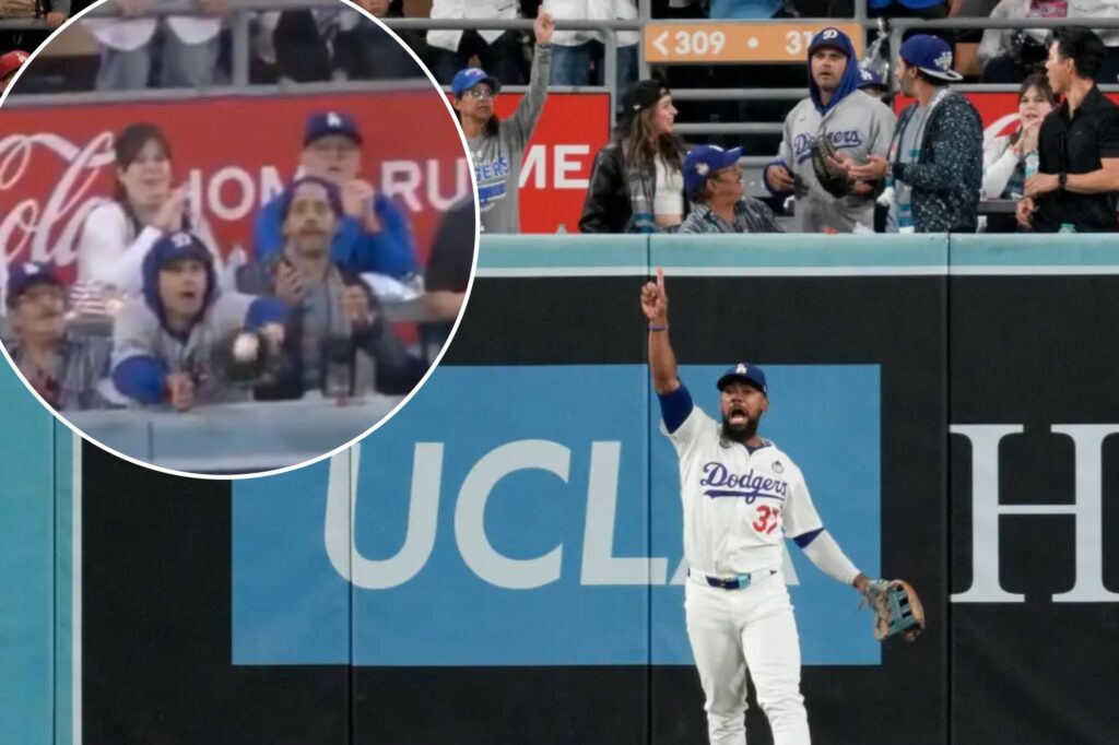 Dodgers fan interferes with deep Yankees fly ball in World Series controversy