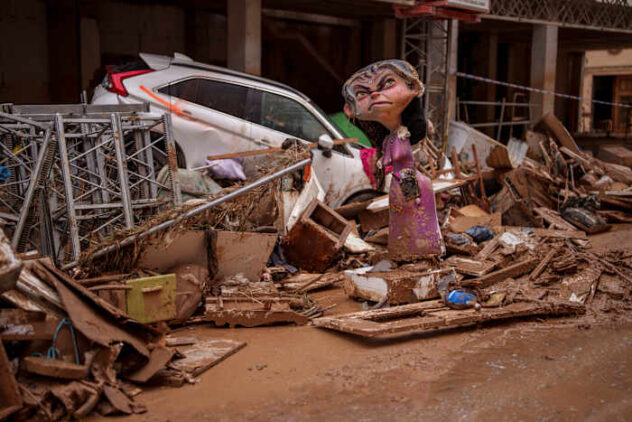 Heavy rains in Barcelona disrupt rail service as troops search for more flood victims in Valencia
