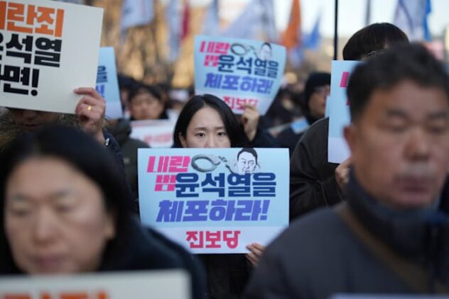 South Korean President Yoon is urged to resign or face impeachment over martial law