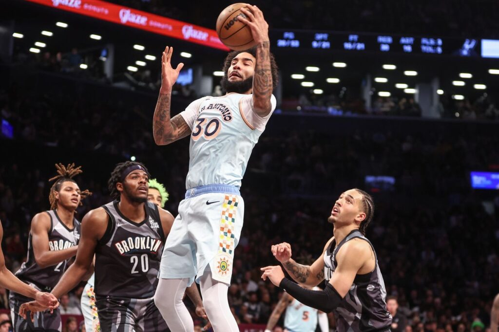 Spurs overcome a rough start with some help from a hometown hero