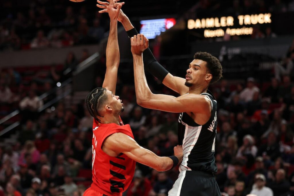 Undermanned Spurs escape Portland with clutch plays from Vassell and Wembanyama