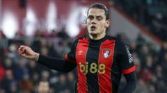 Bournemouth striker Unal tears ACL in training