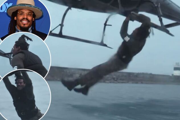 Cam Newton jumps onto moving helicopter from speeding boat in wild reality show stunt
