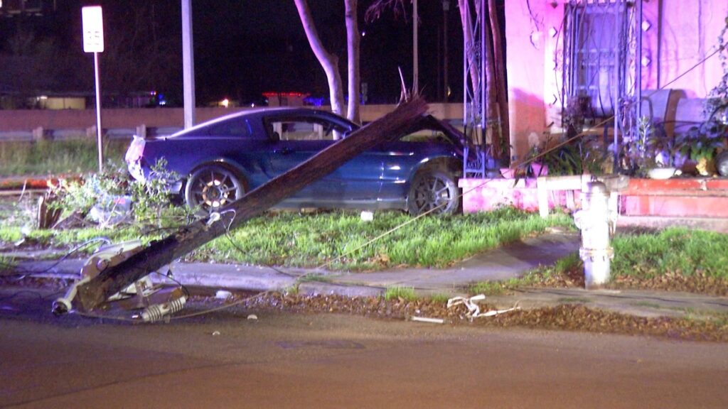 Man injured after crashing car into utility pole, stopping in front yard of home, SAPD says