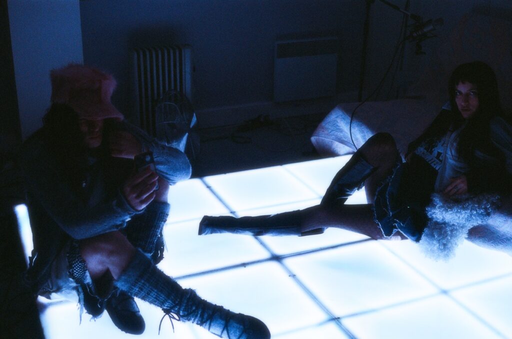 Oklou and Bladee Connect in Video for New Song “Take Me by the Hand”: Watch