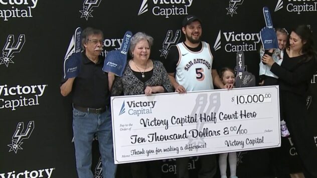 Spurs' half-court shot contest winner received his $10K check