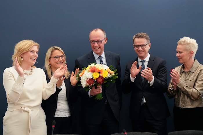 Conservatives win German election while far-right party surges to second place