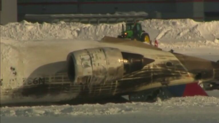 Delta Airlines plane flips on landing in Toronto; child badly hurt, among 17 injured