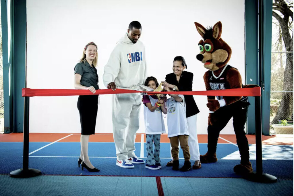 Open Thread: Harrison and Brittany Barnes refurbish the Guadalupe Community Center basketball court