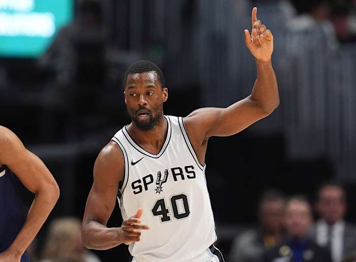 Barnes and Paul lead Spurs past the short-handed Nuggets 113-106