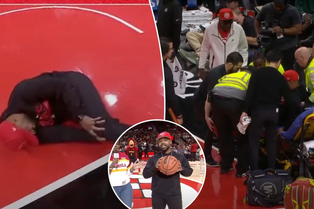 Hawks fan stretchered off court after suffering nasty injury during in-game contest