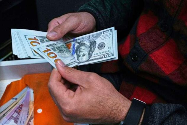 Iran's currency falls to record low against the dollar as tensions run high