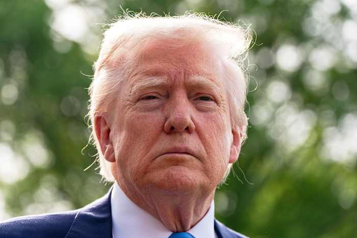 Only about half of Republicans say Trump has focused on the right priorities, AP-NORC poll finds