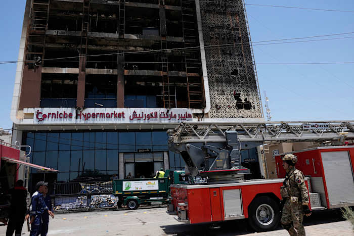 A fire at a shopping center in eastern Iraq kills more than 60 people