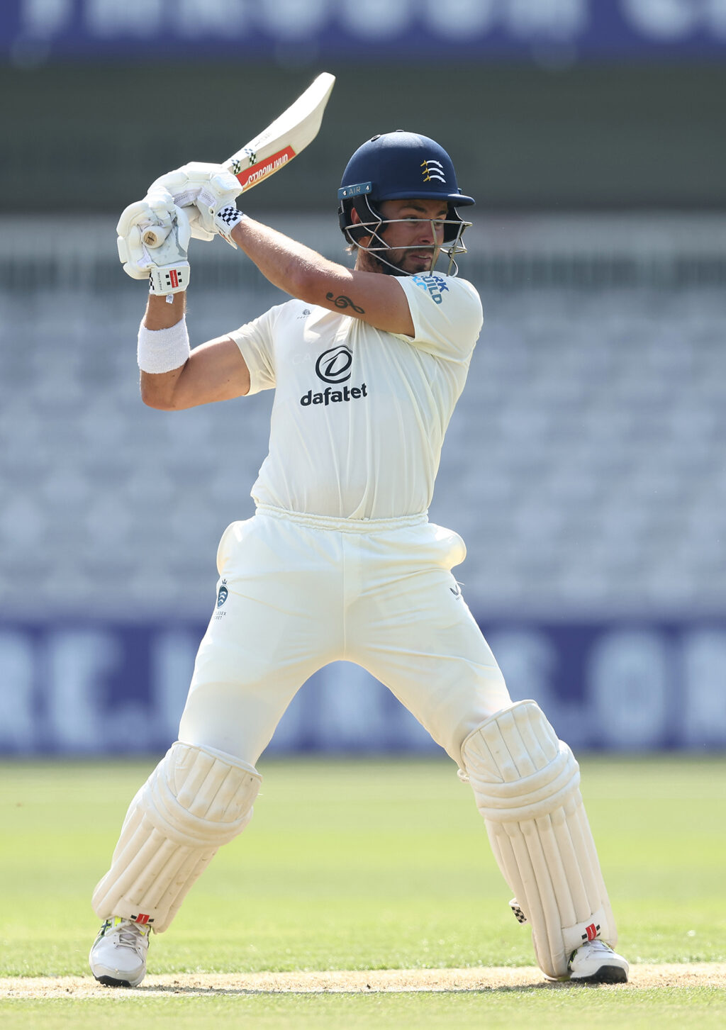 Holden holds firm as Middlesex pile on the runs