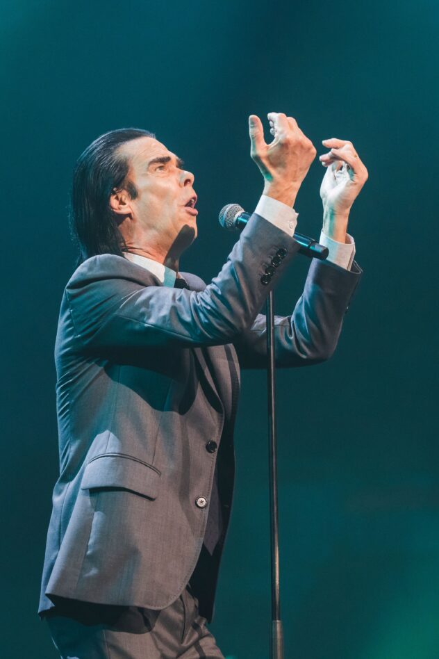 Nick Cave, No Longer So Angry About AI, Shares New “Tupelo” Video Starring an AI Elvis: Watch
