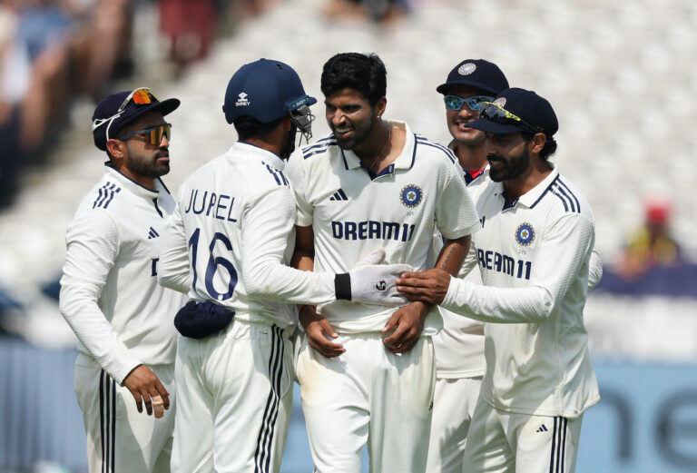 Washington strikes as England approach 200